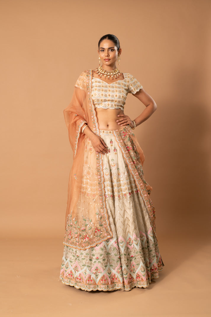 Créme Brûlée Cream Peach Satin Organza Lehenga with Gota Patti & Thread Embroidery