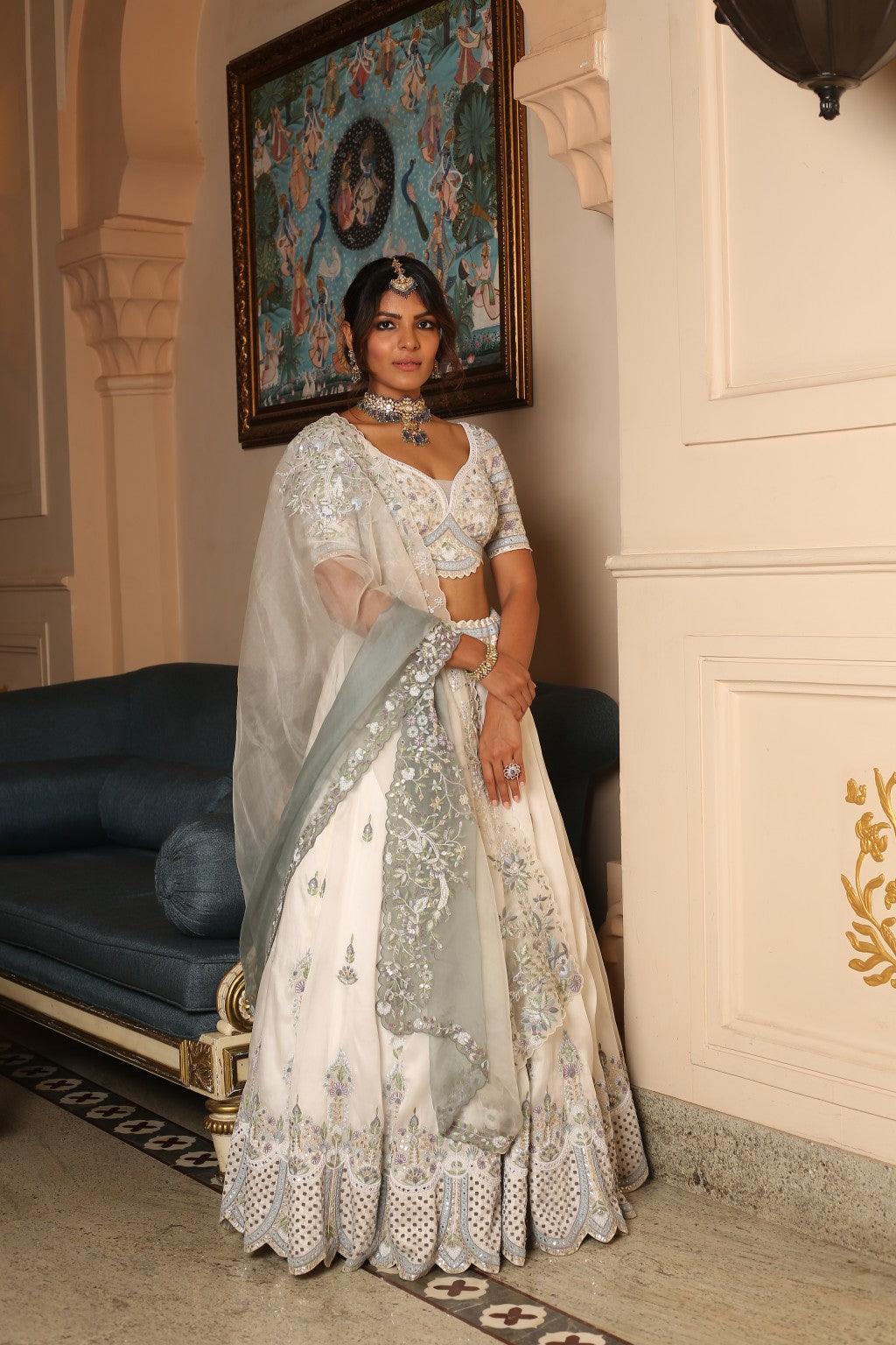 Mahiraa Ivory Satin Organza Lehenga With Kora Threadwork & Shaded Ivory To Ice Grey Dupatta