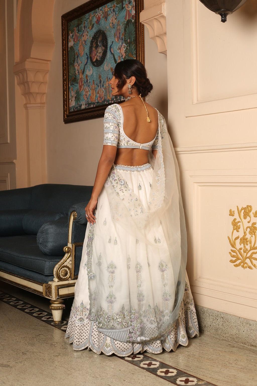 Mahiraa Ivory Satin Organza Lehenga With Kora Threadwork & Shaded Ivory To Ice Grey Dupatta