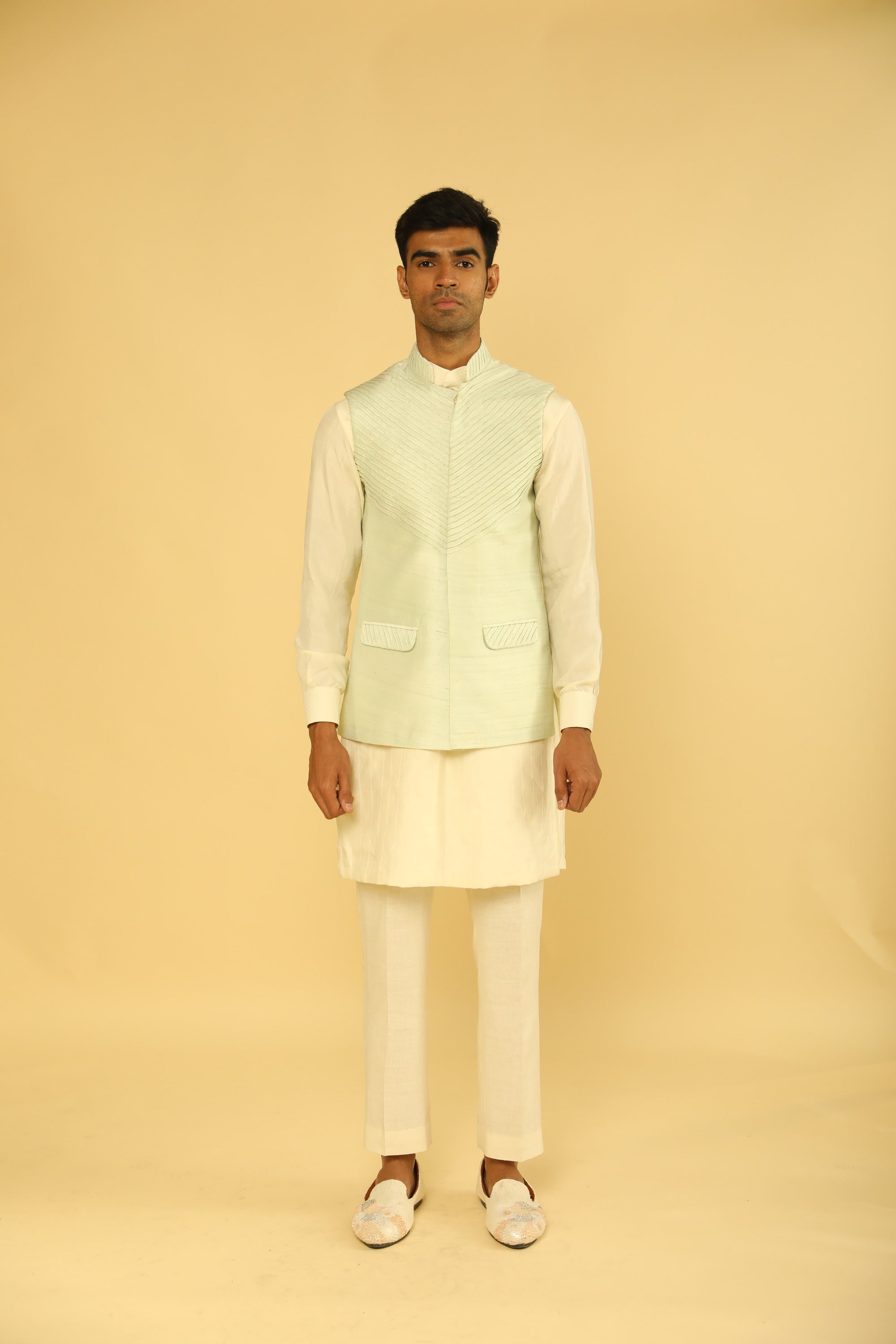 Sea Green Pintuck Bundi And Kurta Set with labyrinthine Dori Work