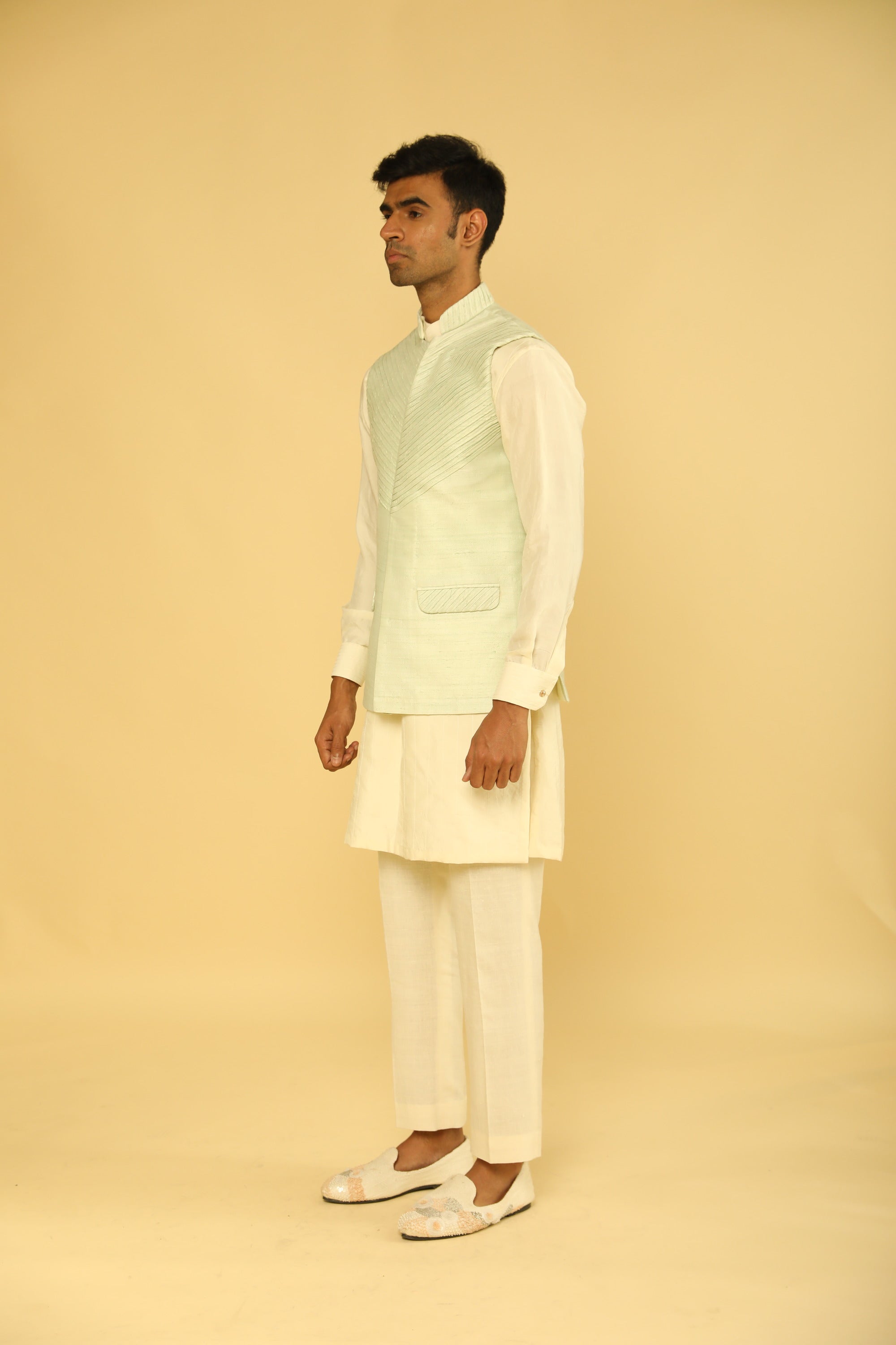 Sea Green Pintuck Bundi And Kurta Set with labyrinthine Dori Work